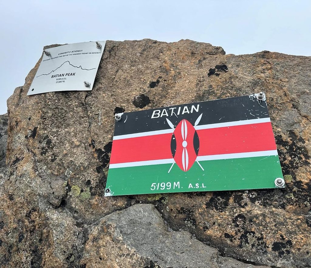 Climber scaling the North Face during a Mount Kenya technical climb