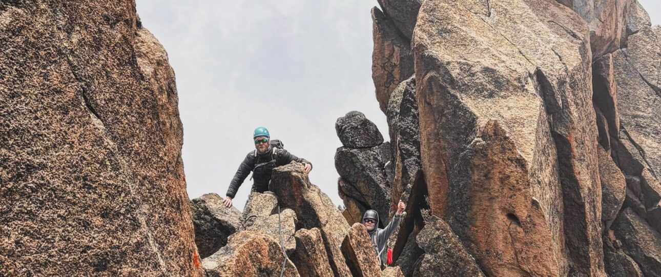 Climber scaling the North Face during a Mount Kenya technical climb