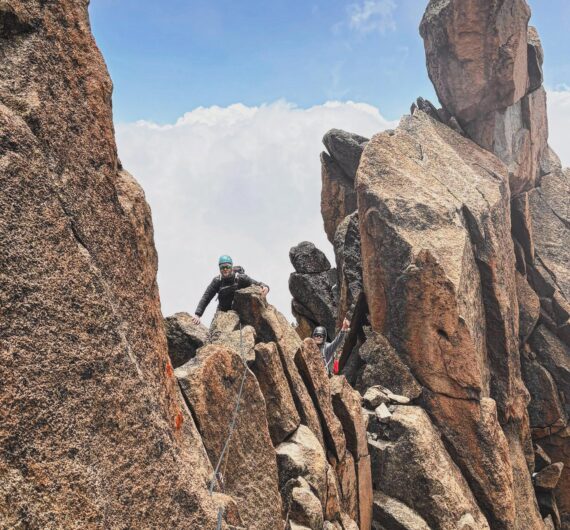 Climber scaling the North Face during a Mount Kenya technical climb